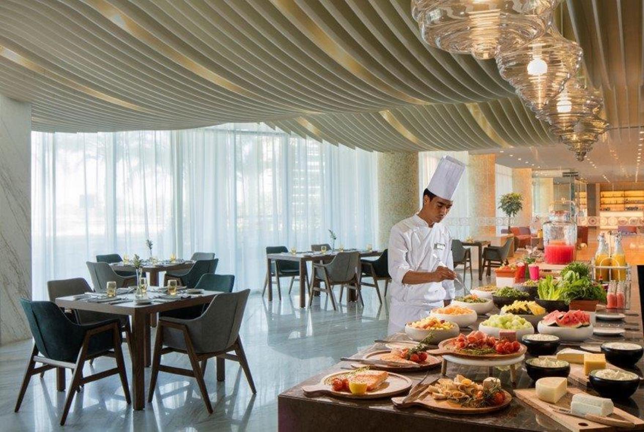 Radisson Blu Hotel Apartment Dubai Silicon Oasis Bagian luar foto