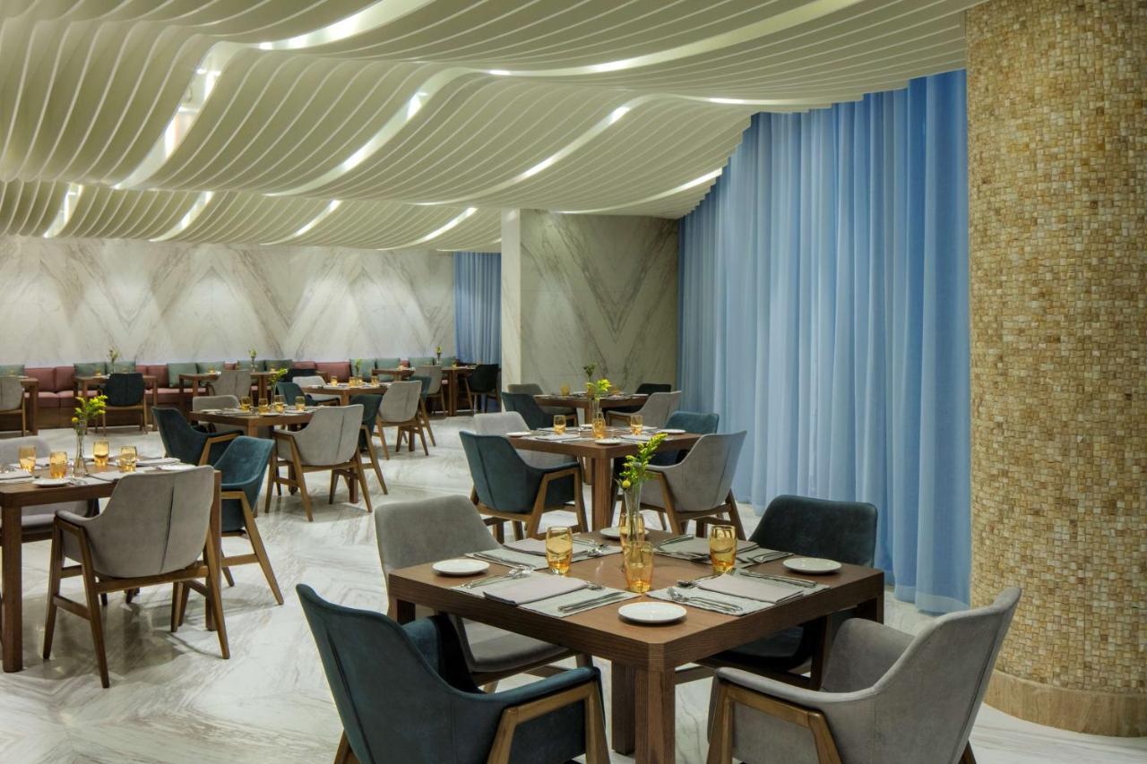 Radisson Blu Hotel Apartment Dubai Silicon Oasis Bagian luar foto